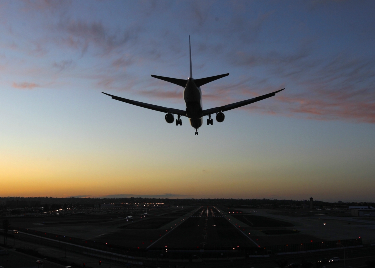 airplane landing at dusk